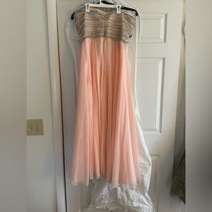 2 girls prom gowns.  Worn once. Like brand new.